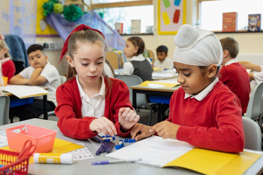 pupils in maths class counting blocks at st botolphs primary school