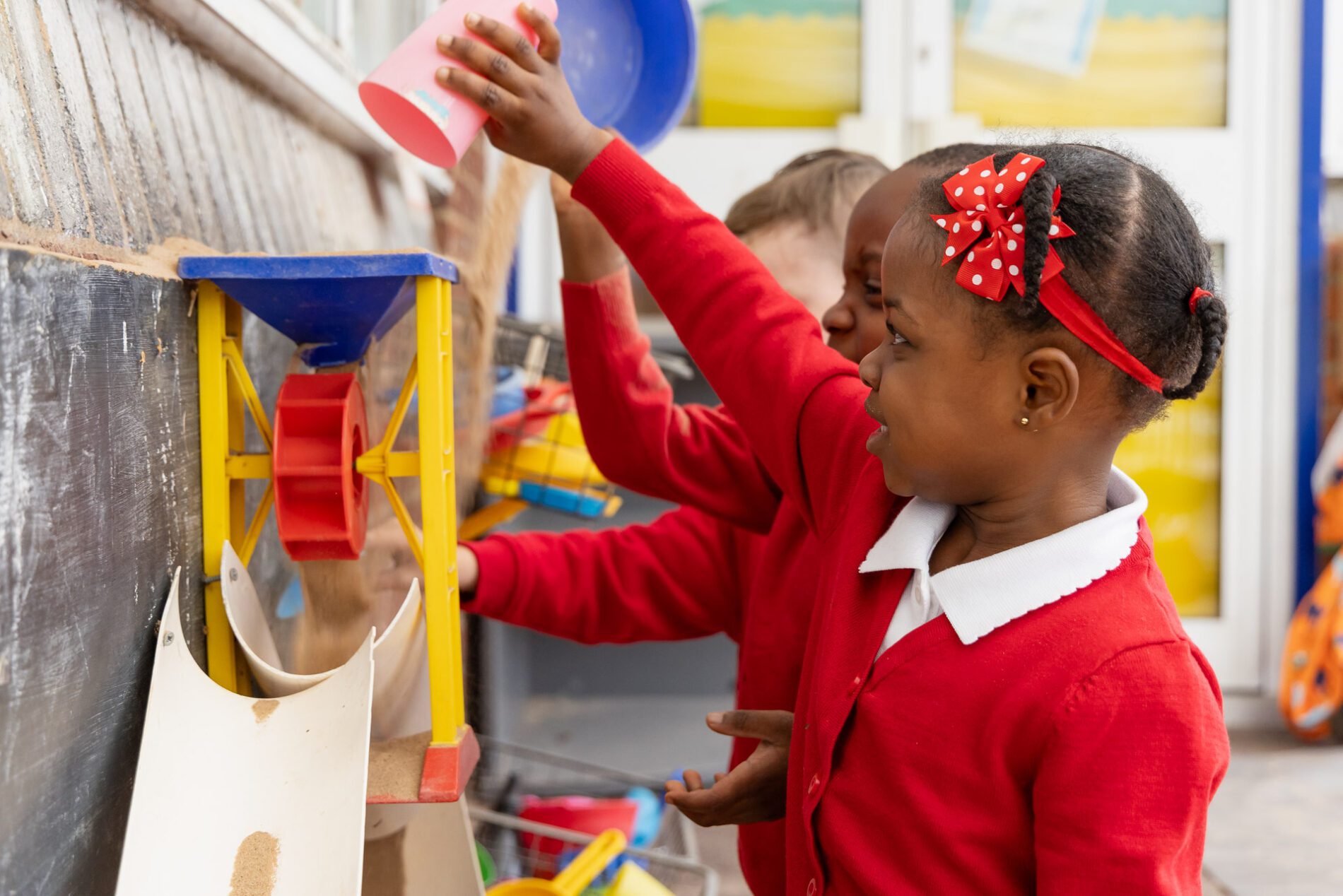 pupils playing in eyfs at st botolphs primary school